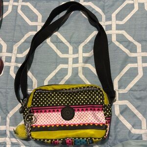 Vintage Kipling Multi color/pattern small Crossbody Purse. Pre loved condition